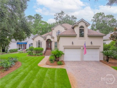 Delight in the exceptional curb appeal of this spacious patio on The Landings Club - Palmetto in Georgia - for sale on GolfHomes.com, golf home, golf lot