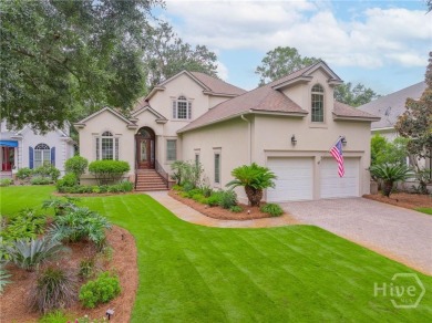 Delight in the exceptional curb appeal of this spacious patio on The Landings Club - Palmetto in Georgia - for sale on GolfHomes.com, golf home, golf lot