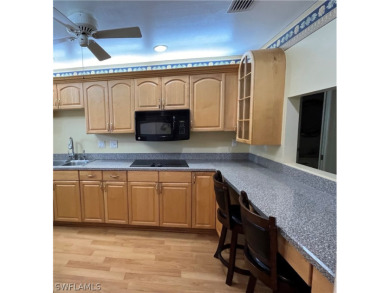 RENOVATED KITCHEN* *SPACIOUS ROOMS* *HUGE INDOOR LAUNDRY CENTER on Myerlee Country Club in Florida - for sale on GolfHomes.com, golf home, golf lot