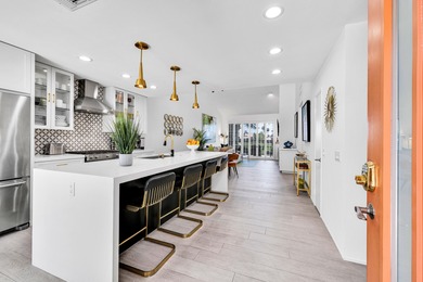 This home has been opened up to create a one of a kind on PGA West Private Golf Courses in California - for sale on GolfHomes.com, golf home, golf lot