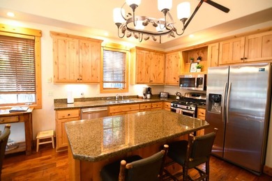 Hassle-free home ownership with all of the amenities! on McCall Municipal Golf Course in Idaho - for sale on GolfHomes.com, golf home, golf lot