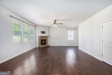 Experience golf course living at its finest in this spacious on Mirror Lake Golf Club in Georgia - for sale on GolfHomes.com, golf home, golf lot
