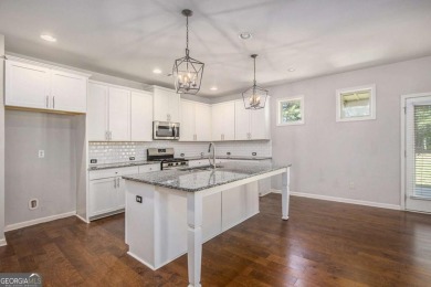 Experience golf course living at its finest in this spacious on Mirror Lake Golf Club in Georgia - for sale on GolfHomes.com, golf home, golf lot
