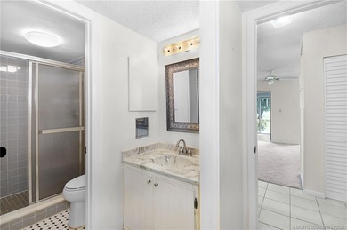 First floor 1 Bedroom / 2 Bath end unit condo in the Miles Grant on Miles Grant Country Club in Florida - for sale on GolfHomes.com, golf home, golf lot