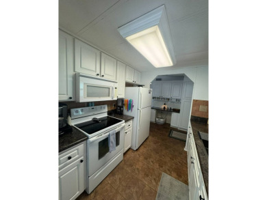 Here's a great house that offers a lot of value and is turnkey on The Meadows At Countrywood in Florida - for sale on GolfHomes.com, golf home, golf lot