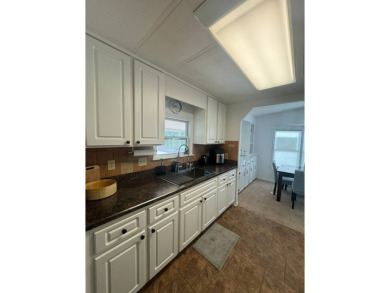Here's a great house that offers a lot of value and is turnkey on The Meadows At Countrywood in Florida - for sale on GolfHomes.com, golf home, golf lot