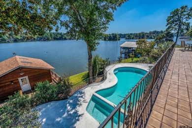 This beautiful lakefront property in Hideaway offers everything on Hide-A-Way Lake Golf Course in Texas - for sale on GolfHomes.com, golf home, golf lot