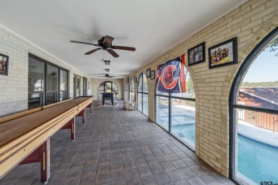 This beautiful lakefront property in Hideaway offers everything on Hide-A-Way Lake Golf Course in Texas - for sale on GolfHomes.com, golf home, golf lot