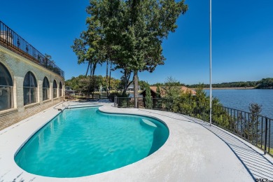 This beautiful lakefront property in Hideaway offers everything on Hide-A-Way Lake Golf Course in Texas - for sale on GolfHomes.com, golf home, golf lot