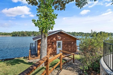 This beautiful lakefront property in Hideaway offers everything on Hide-A-Way Lake Golf Course in Texas - for sale on GolfHomes.com, golf home, golf lot