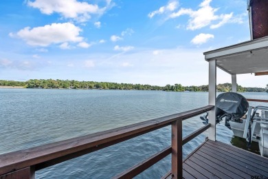 This beautiful lakefront property in Hideaway offers everything on Hide-A-Way Lake Golf Course in Texas - for sale on GolfHomes.com, golf home, golf lot