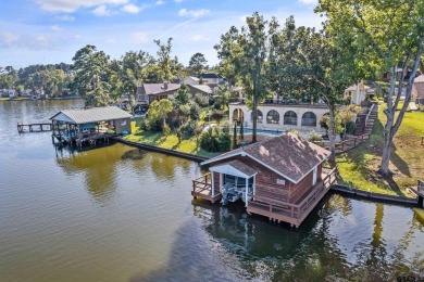 This beautiful lakefront property in Hideaway offers everything on Hide-A-Way Lake Golf Course in Texas - for sale on GolfHomes.com, golf home, golf lot