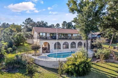 This beautiful lakefront property in Hideaway offers everything on Hide-A-Way Lake Golf Course in Texas - for sale on GolfHomes.com, golf home, golf lot