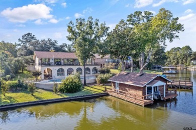 This beautiful lakefront property in Hideaway offers everything on Hide-A-Way Lake Golf Course in Texas - for sale on GolfHomes.com, golf home, golf lot