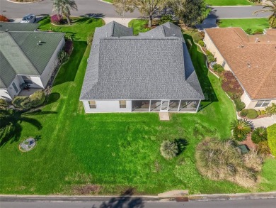 NO BOND on this IMMACULATE 3 Bedroom GAS Designer Hibiscus (3rd on The Links of Spruce Creek in Florida - for sale on GolfHomes.com, golf home, golf lot
