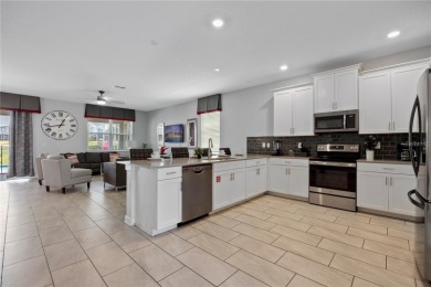 FULLY FURNISHED 9 bedrooms/5 full bathrooms vacation home on ChampionsGate Golf Resort in Florida - for sale on GolfHomes.com, golf home, golf lot