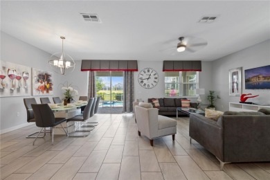 FULLY FURNISHED 9 bedrooms/5 full bathrooms vacation home on ChampionsGate Golf Resort in Florida - for sale on GolfHomes.com, golf home, golf lot