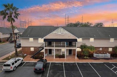 Welcome to this delightful second-floor end-unit condo, offering on East Bay Golf Club in Florida - for sale on GolfHomes.com, golf home, golf lot