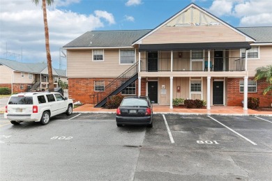 Welcome to this delightful second-floor end-unit condo, offering on East Bay Golf Club in Florida - for sale on GolfHomes.com, golf home, golf lot