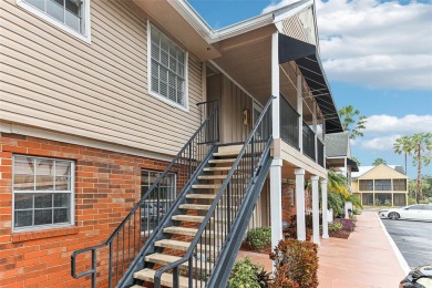 Welcome to this delightful second-floor end-unit condo, offering on East Bay Golf Club in Florida - for sale on GolfHomes.com, golf home, golf lot