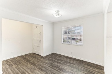 Welcome to this delightful second-floor end-unit condo, offering on East Bay Golf Club in Florida - for sale on GolfHomes.com, golf home, golf lot
