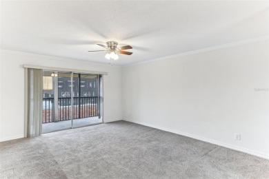 Welcome to this delightful second-floor end-unit condo, offering on East Bay Golf Club in Florida - for sale on GolfHomes.com, golf home, golf lot