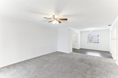 Welcome to this delightful second-floor end-unit condo, offering on East Bay Golf Club in Florida - for sale on GolfHomes.com, golf home, golf lot