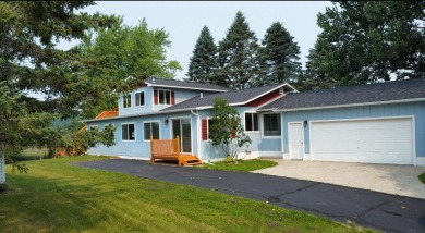 This peaceful Harrisville home, nestled along the fairways of on Greenbush Golf Course in Michigan - for sale on GolfHomes.com, golf home, golf lot