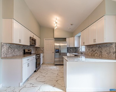 You won't want to miss this beautifully renovated 4-bedroom on Lake Monticello Golf Course in Virginia - for sale on GolfHomes.com, golf home, golf lot