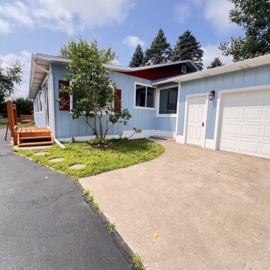 This peaceful Harrisville home, nestled along the fairways of on Greenbush Golf Course in Michigan - for sale on GolfHomes.com, golf home, golf lot