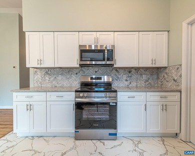 You won't want to miss this beautifully renovated 4-bedroom on Lake Monticello Golf Course in Virginia - for sale on GolfHomes.com, golf home, golf lot