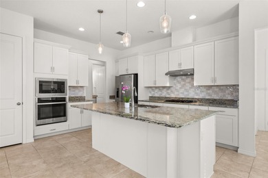 Experience the pinnacle of serene luxury in this exquisitely on Mystic Dunes Resort and Golf Club in Florida - for sale on GolfHomes.com, golf home, golf lot