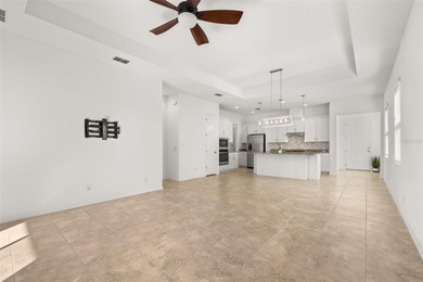 Experience the pinnacle of serene luxury in this exquisitely on Mystic Dunes Resort and Golf Club in Florida - for sale on GolfHomes.com, golf home, golf lot