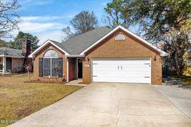 This well-maintained 3-bedroom, 2-bath brick home offers comfort on Diamondhead Country Club in Mississippi - for sale on GolfHomes.com, golf home, golf lot
