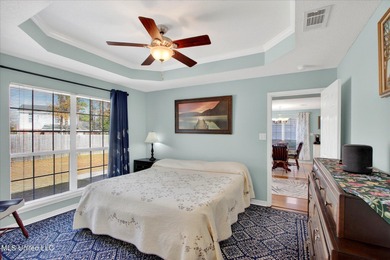 This well-maintained 3-bedroom, 2-bath brick home offers comfort on Diamondhead Country Club in Mississippi - for sale on GolfHomes.com, golf home, golf lot