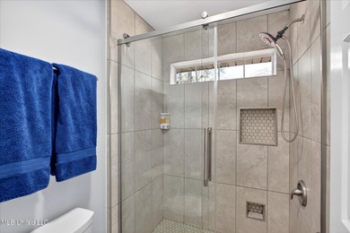 This well-maintained 3-bedroom, 2-bath brick home offers comfort on Diamondhead Country Club in Mississippi - for sale on GolfHomes.com, golf home, golf lot