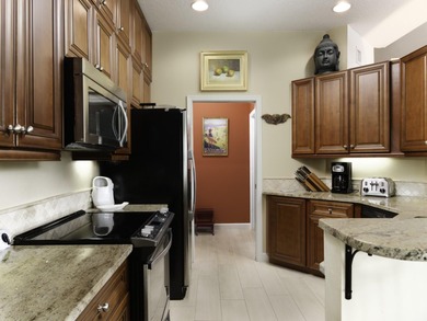 Discover the Resort Villas at PGA National Golf & Country Club on PGA National Golf Club in Florida - for sale on GolfHomes.com, golf home, golf lot