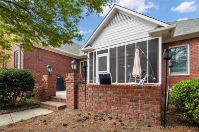 This charming brick home is nestled on the 17th fairway of on Cypress Lakes Golf Course in North Carolina - for sale on GolfHomes.com, golf home, golf lot