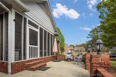 This charming brick home is nestled on the 17th fairway of on Cypress Lakes Golf Course in North Carolina - for sale on GolfHomes.com, golf home, golf lot