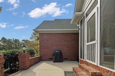 This charming brick home is nestled on the 17th fairway of on Cypress Lakes Golf Course in North Carolina - for sale on GolfHomes.com, golf home, golf lot