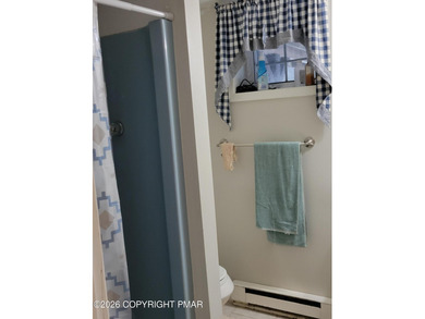 Experience the perfect blend of mountain serenity and modern on Pocono Farms Country Club in Pennsylvania - for sale on GolfHomes.com, golf home, golf lot