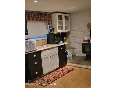 Experience the perfect blend of mountain serenity and modern on Pocono Farms Country Club in Pennsylvania - for sale on GolfHomes.com, golf home, golf lot