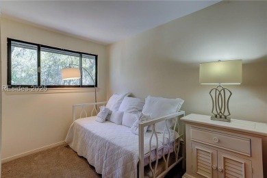 Tucked away in a serene setting on the Trent Jones Golf Course on Palmetto Dunes Golf Course and Resort in South Carolina - for sale on GolfHomes.com, golf home, golf lot