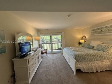 Tucked away in a serene setting on the Trent Jones Golf Course on Palmetto Dunes Golf Course and Resort in South Carolina - for sale on GolfHomes.com, golf home, golf lot