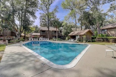 Tucked away in a serene setting on the Trent Jones Golf Course on Palmetto Dunes Golf Course and Resort in South Carolina - for sale on GolfHomes.com, golf home, golf lot