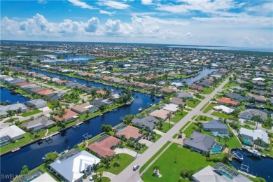 This immaculate waterfront canal pool home with gulf-access is on Saint Andrews South Golf Club in Florida - for sale on GolfHomes.com, golf home, golf lot