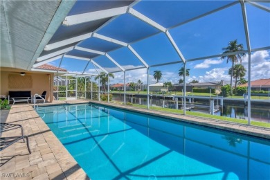 This immaculate waterfront canal pool home with gulf-access is on Saint Andrews South Golf Club in Florida - for sale on GolfHomes.com, golf home, golf lot