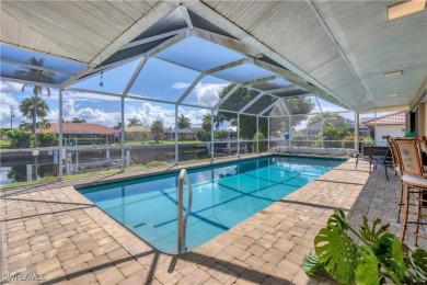 This immaculate waterfront canal pool home with gulf-access is on Saint Andrews South Golf Club in Florida - for sale on GolfHomes.com, golf home, golf lot