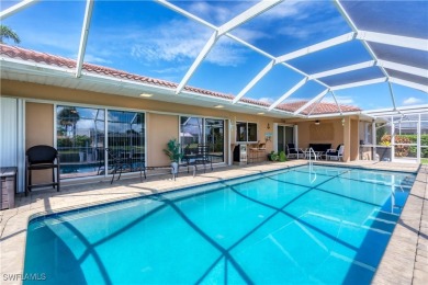 This immaculate waterfront canal pool home with gulf-access is on Saint Andrews South Golf Club in Florida - for sale on GolfHomes.com, golf home, golf lot
