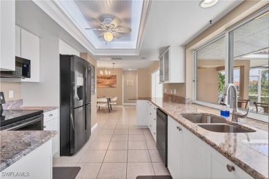 This immaculate waterfront canal pool home with gulf-access is on Saint Andrews South Golf Club in Florida - for sale on GolfHomes.com, golf home, golf lot